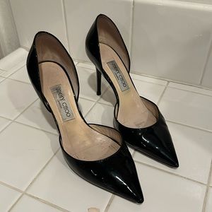 Jimmy Choo patent leather black pumps.